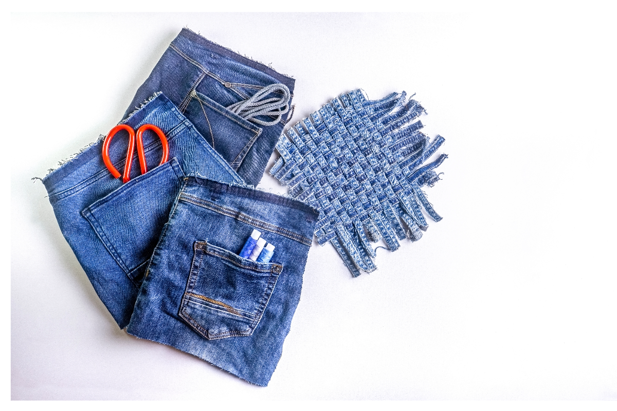 A pair of scissors and scissors in jeans pocket

Description automatically generated